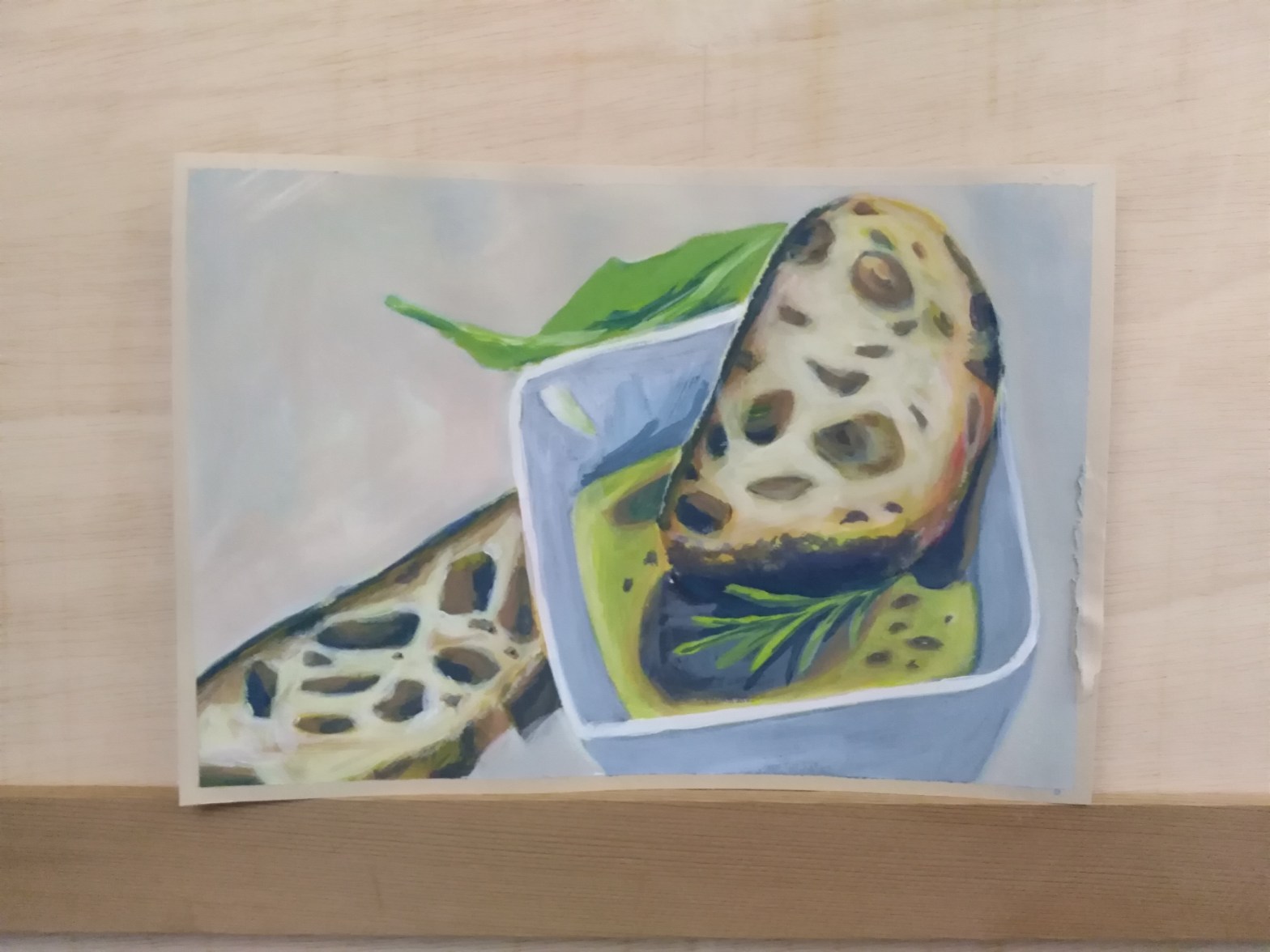 Bild von zwei Weißbrotscheiben mit Olivenöl, Balsamicoessig, Rosmarin, Salatblatt in einer Schüssel